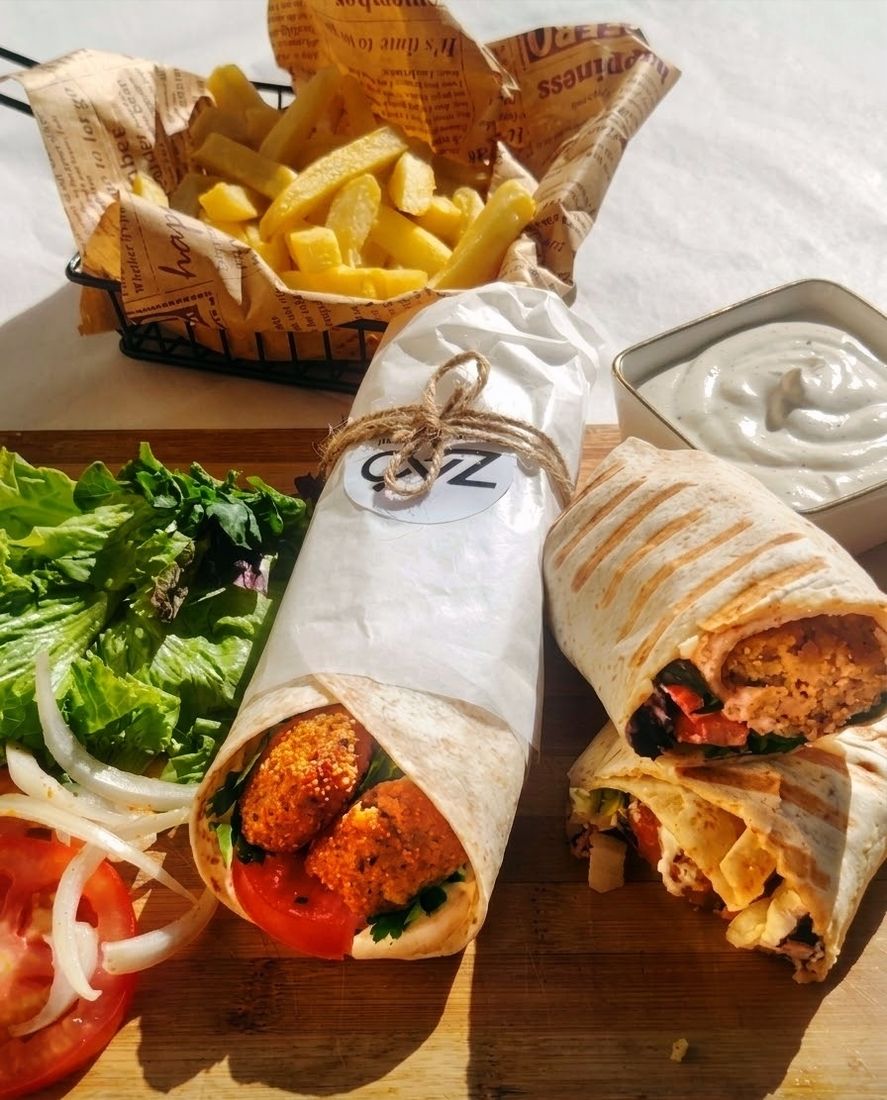 Falafel wraps in Zad paper with chips and sauce
